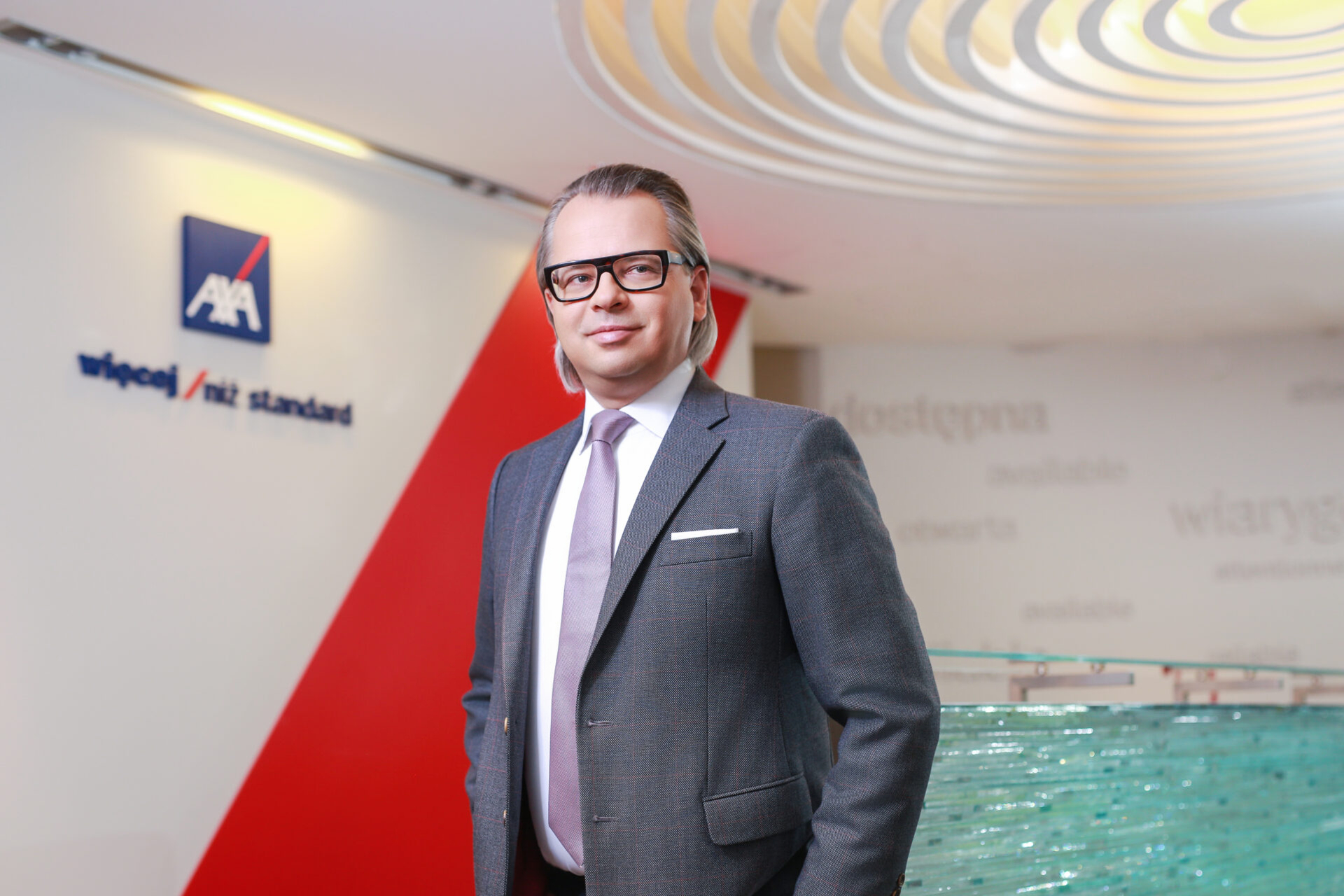 zdjęcia biznesowe i fotografia korporacyjna zdjęcia biznesowe Warszawa prezes Axa FORMAT, sesja biznesowa w biurze